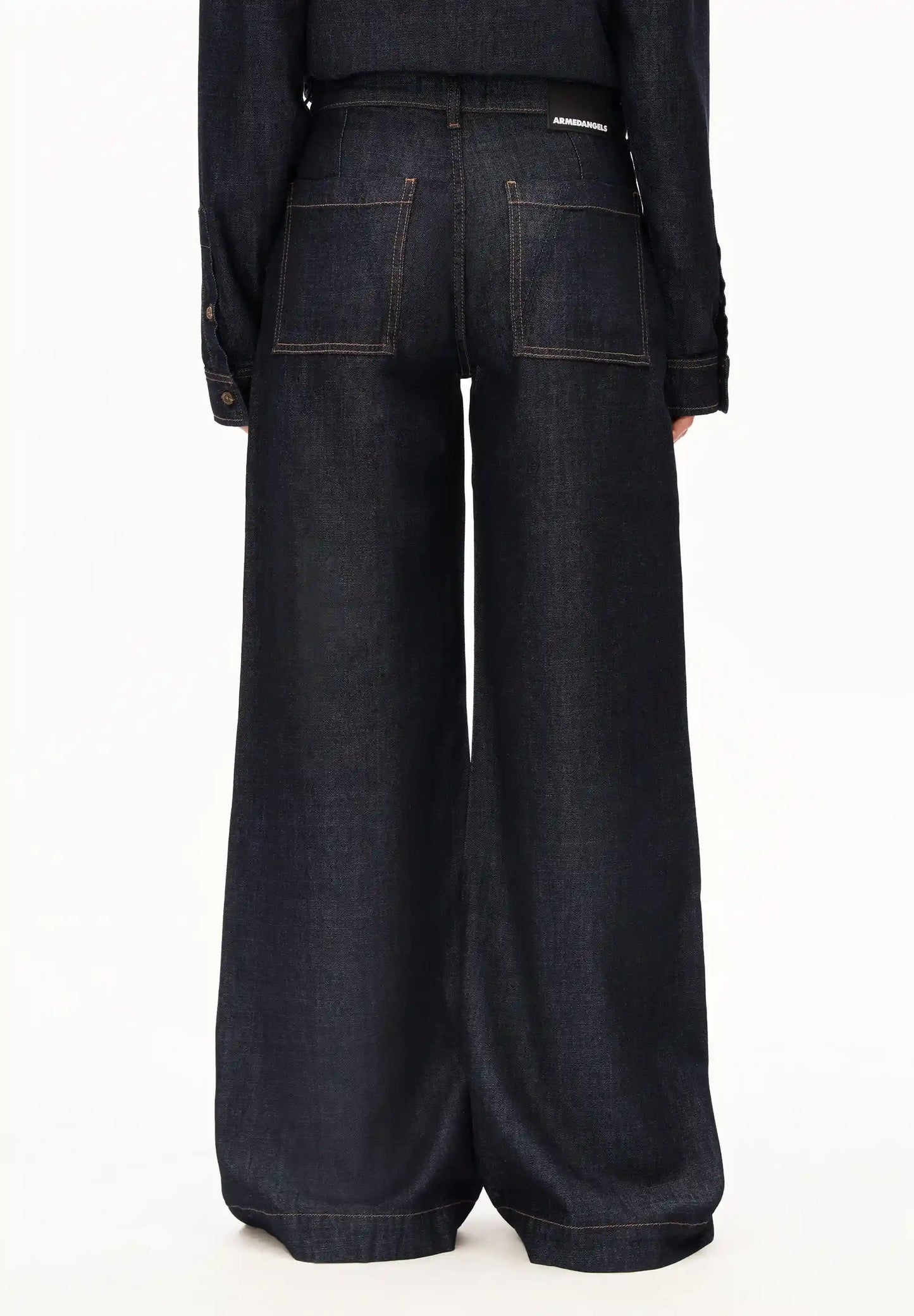 ARMEDANGELS Canada - ASTRAEAAS Tailored Pant in Rinse back view on model