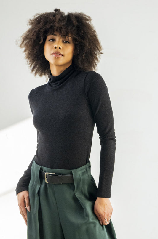 BodyBag by Jude fitted black turtleneck top on model with long sleeves Tops and Blouses in Kelowna