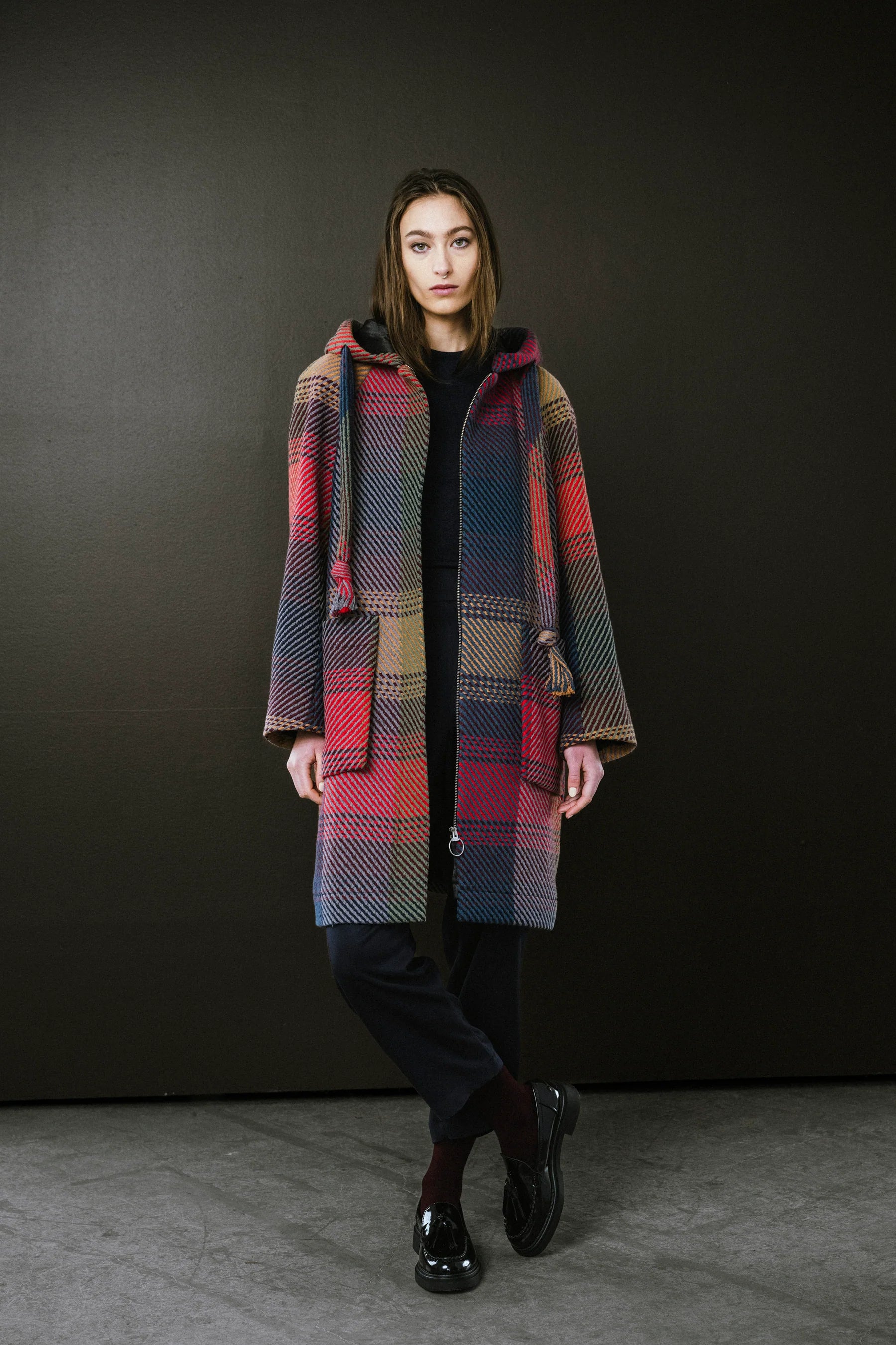 BodyBag by Jude plaid coat featuring a stylish hood and vibrant multi-colour pattern in Kelowna
