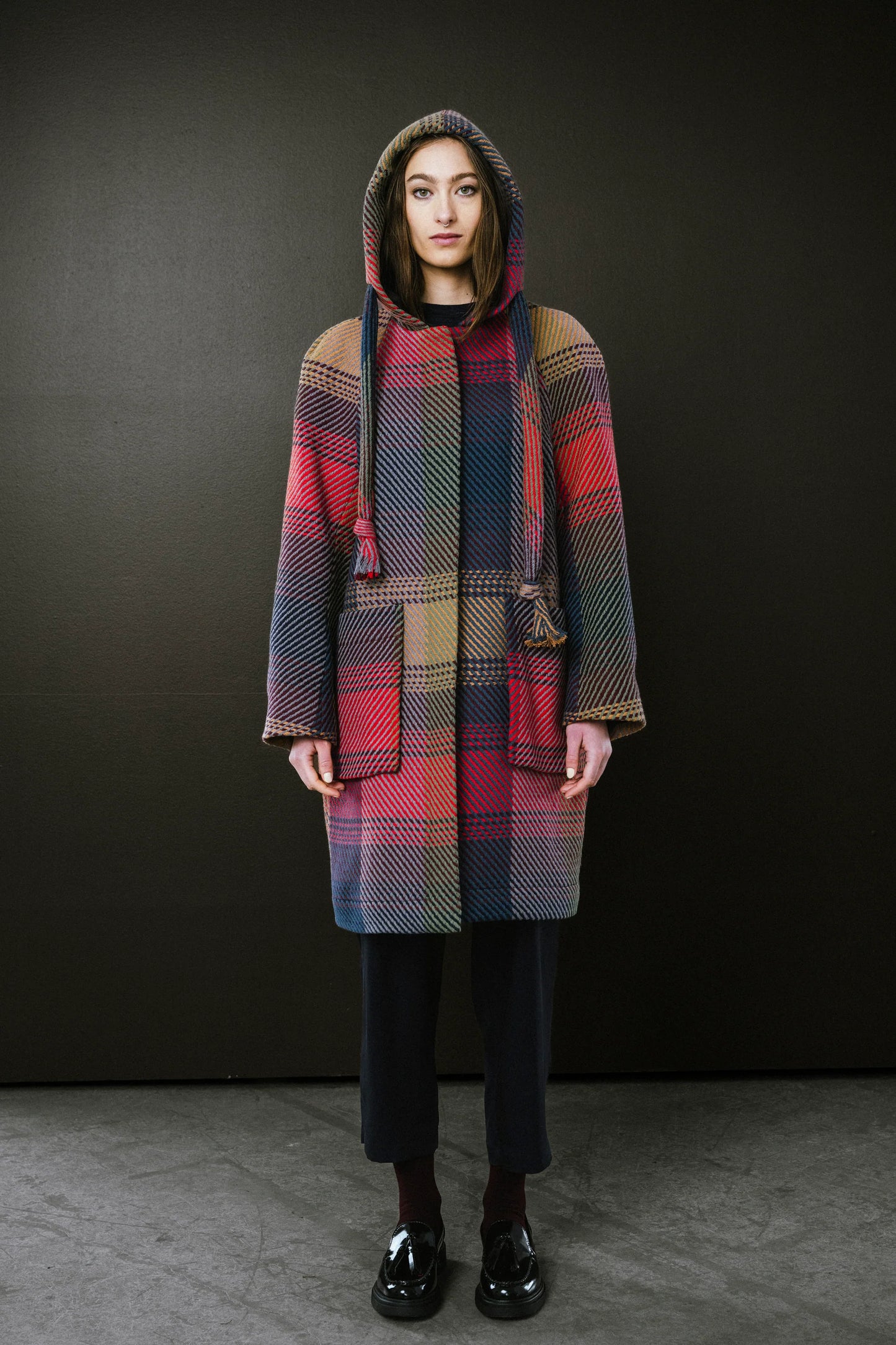 BodyBag by Jude plaid coat with a hood and large pockets in a colorful checked pattern in Kelowna