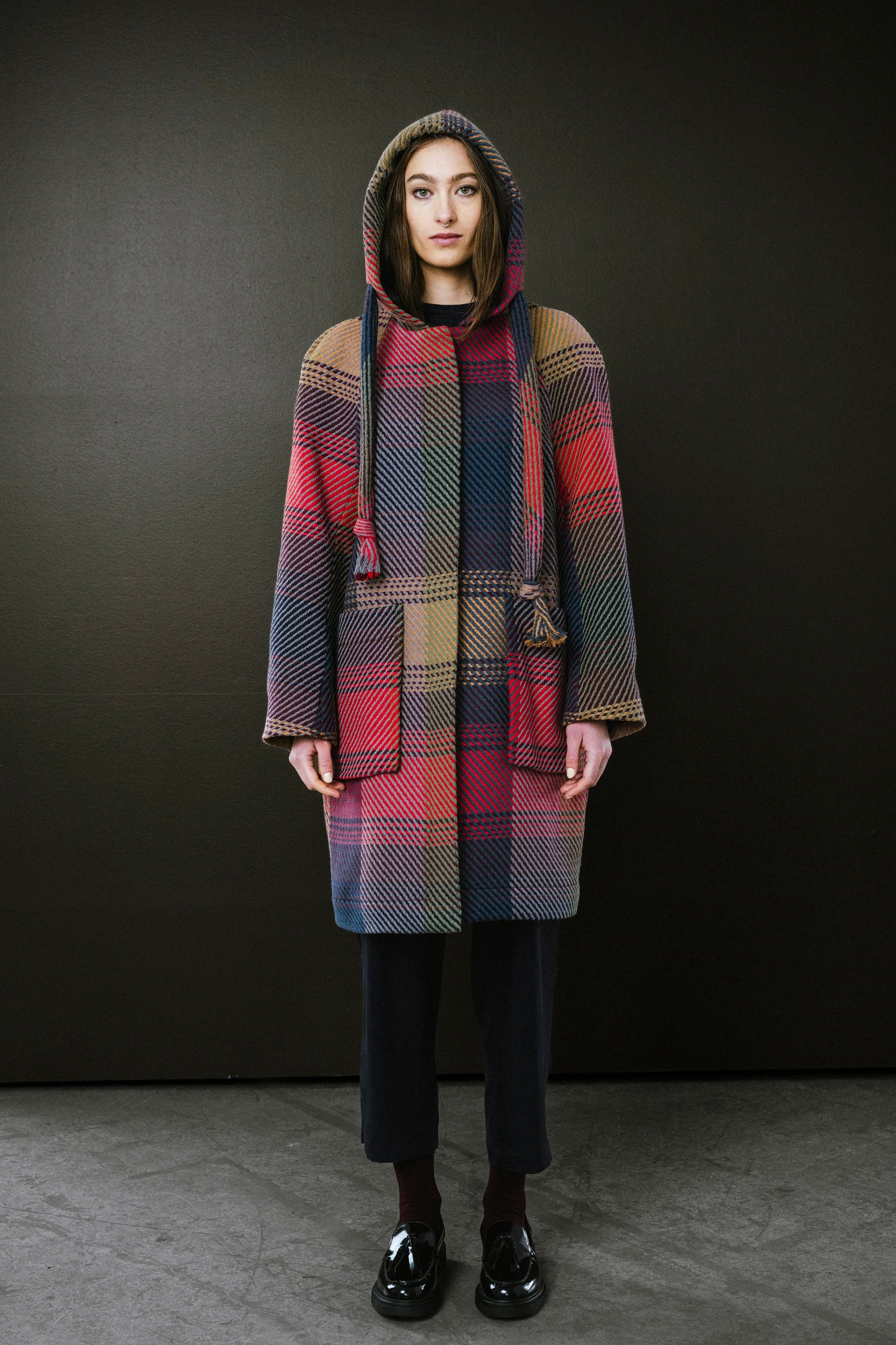 BodyBag by Jude plaid coat with a hood and large pockets in a colorful checked pattern in Kelowna