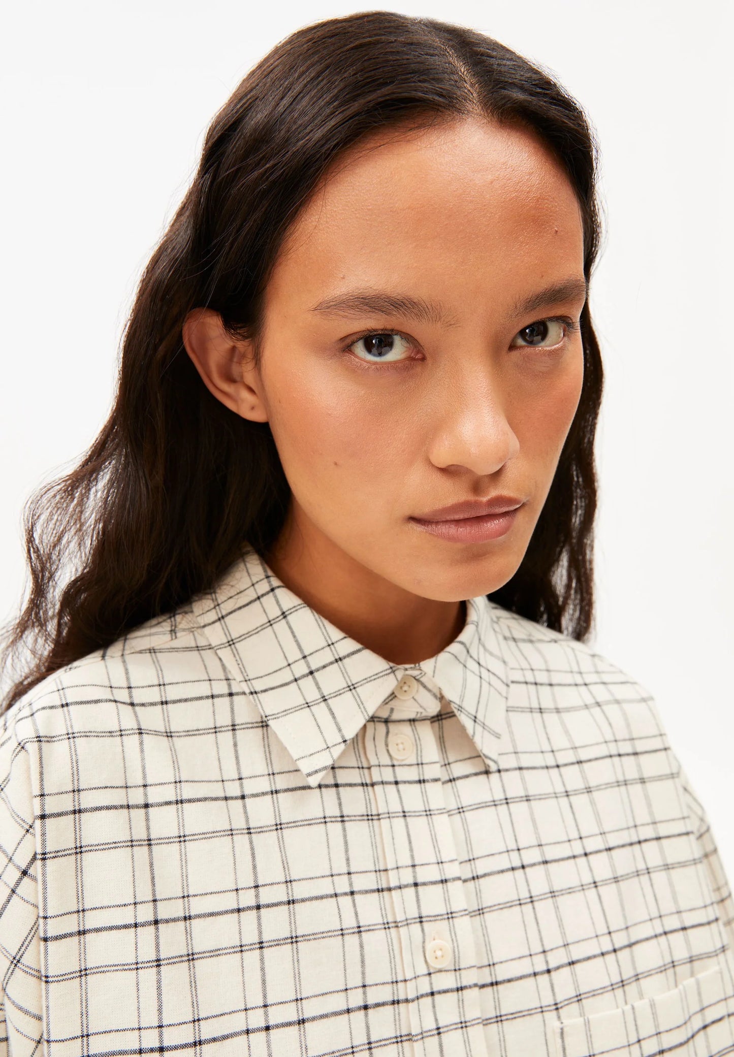 ARMEDANGELS Canada - CHECK Boxy Blouse in Oatmilk-Black close up view of neck and shoulder details on model