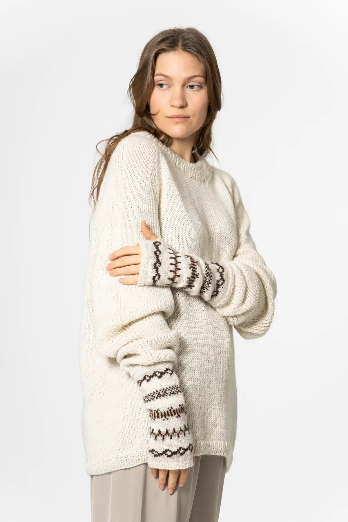Dinadi handmade cream mitten-style arm warmers with decorative brown patterns for cozy layering in Kelowna and Canada