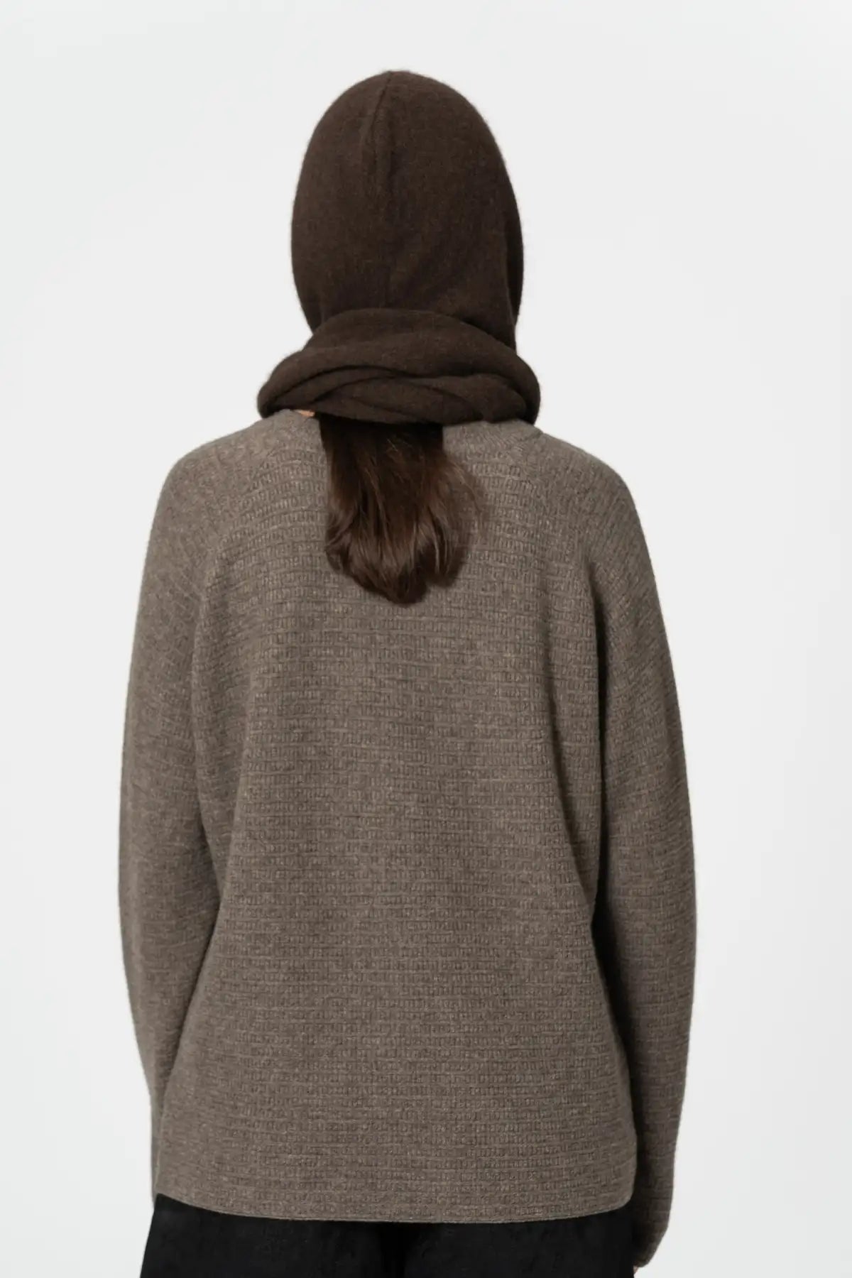 Brown Dinadi scarf worn with a matching hooded sweater for a cozy look in Kelowna and Canada