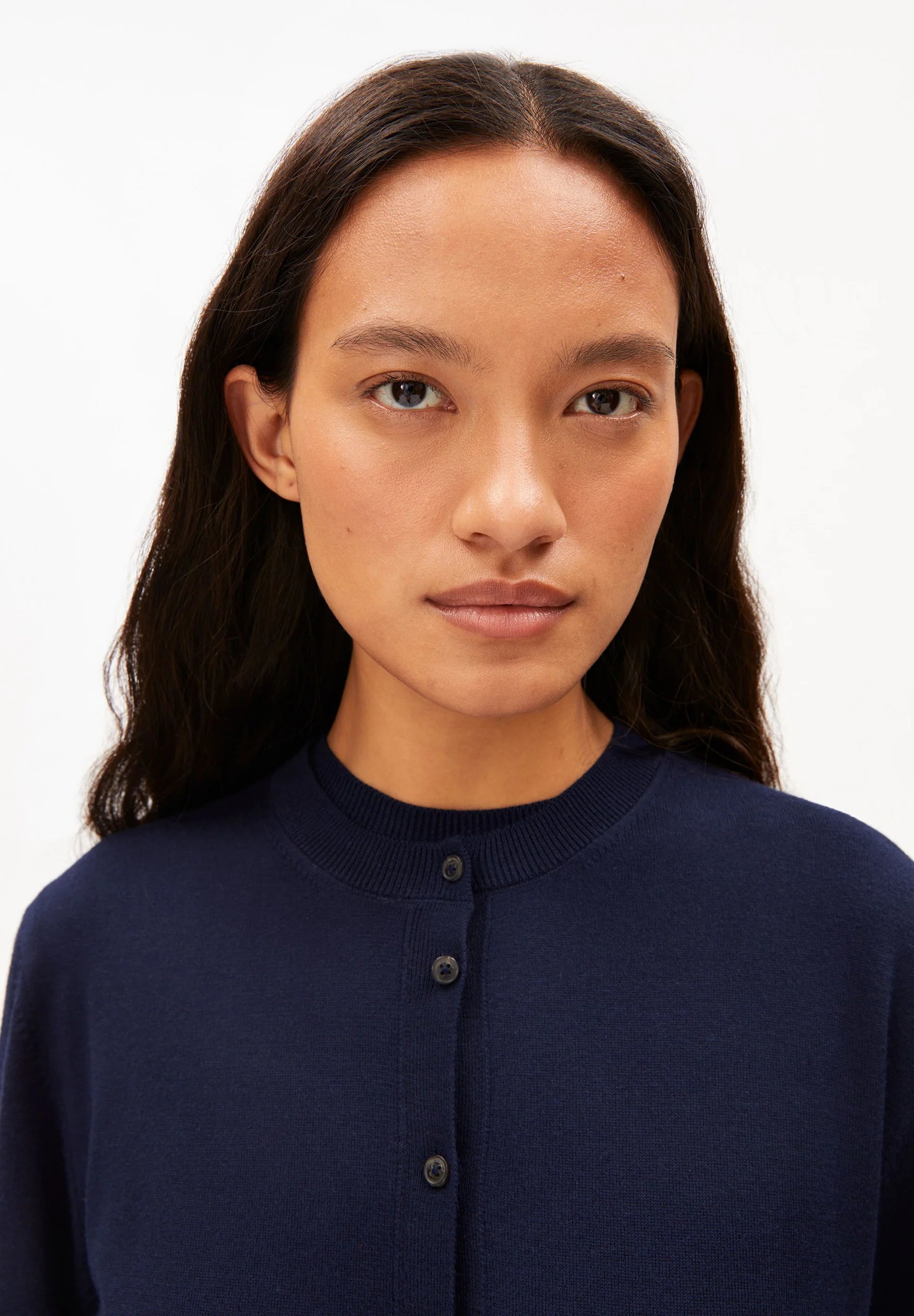 ARMEDANGELS Canada - FINE Knit Cardigan in Tinted Navy close up on model of front neck and buttons