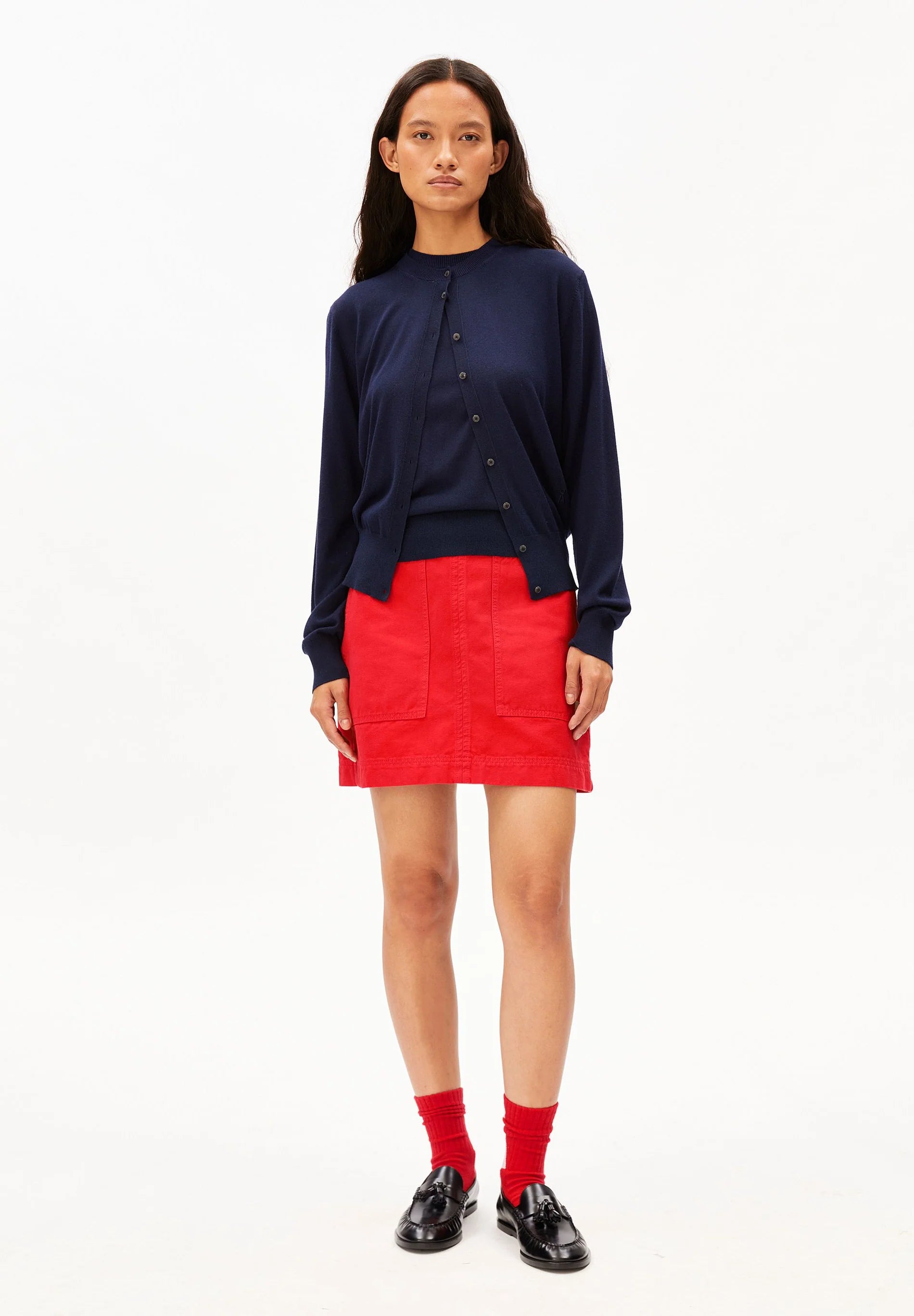 ARMEDANGELS Canada - FINE Knit Cardigan in Tinted Navy full body front on model in red shorts