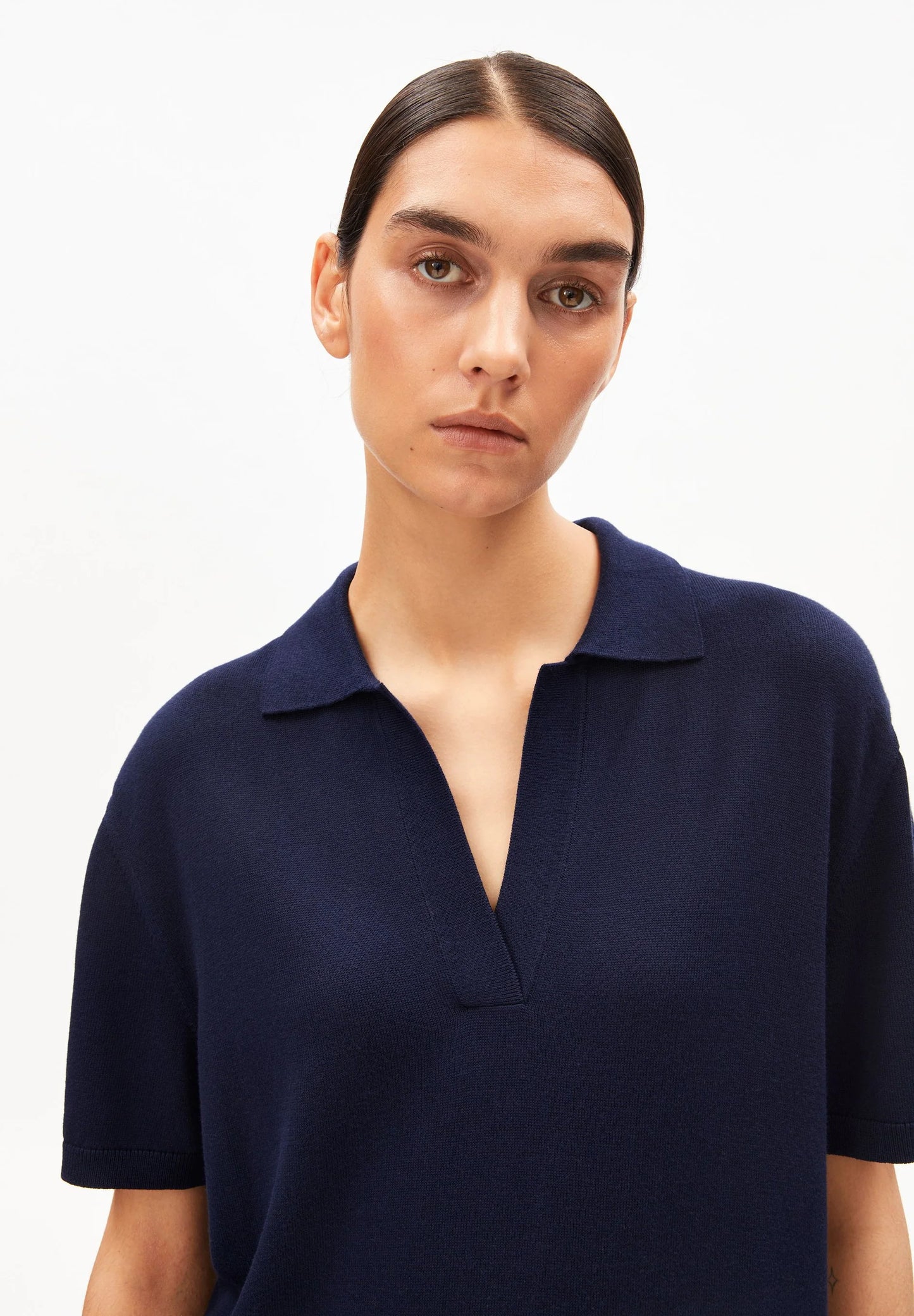 ARMEDANGELS Canada - FINE Polo Knit Dress in Tinted Navy - close up on model of neck detailing