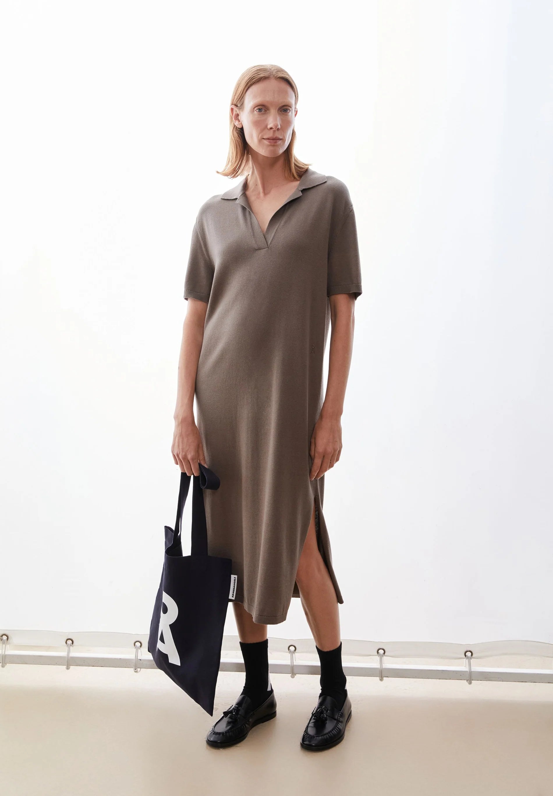 ARMEDANGELS Canada - FINE Polo Knit Dress in Walnut Cream on model carrying a bag