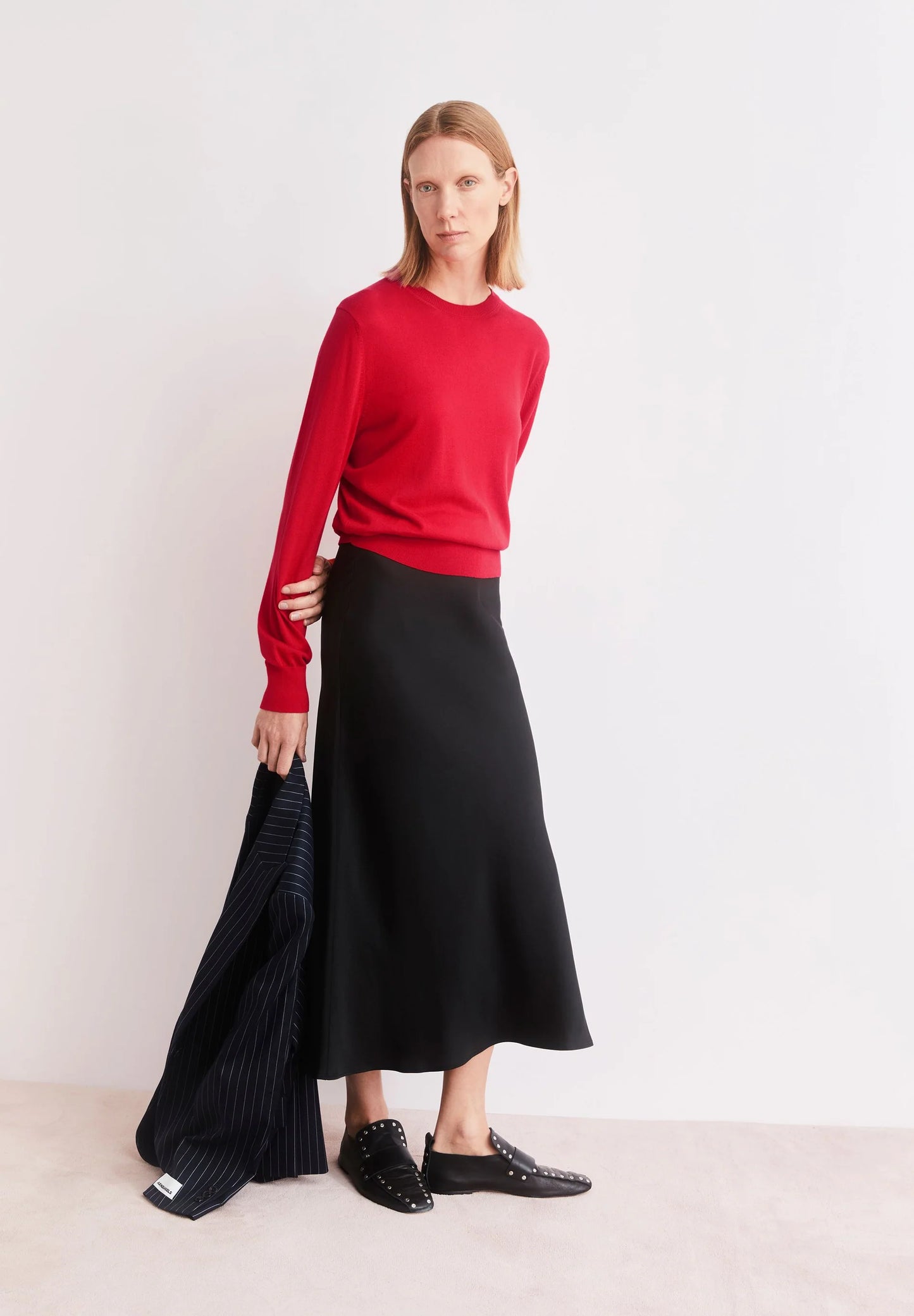 ARMEDANGELS Canada - LENOVAA Satin Slip-Skirt in Black with model holding her jacket