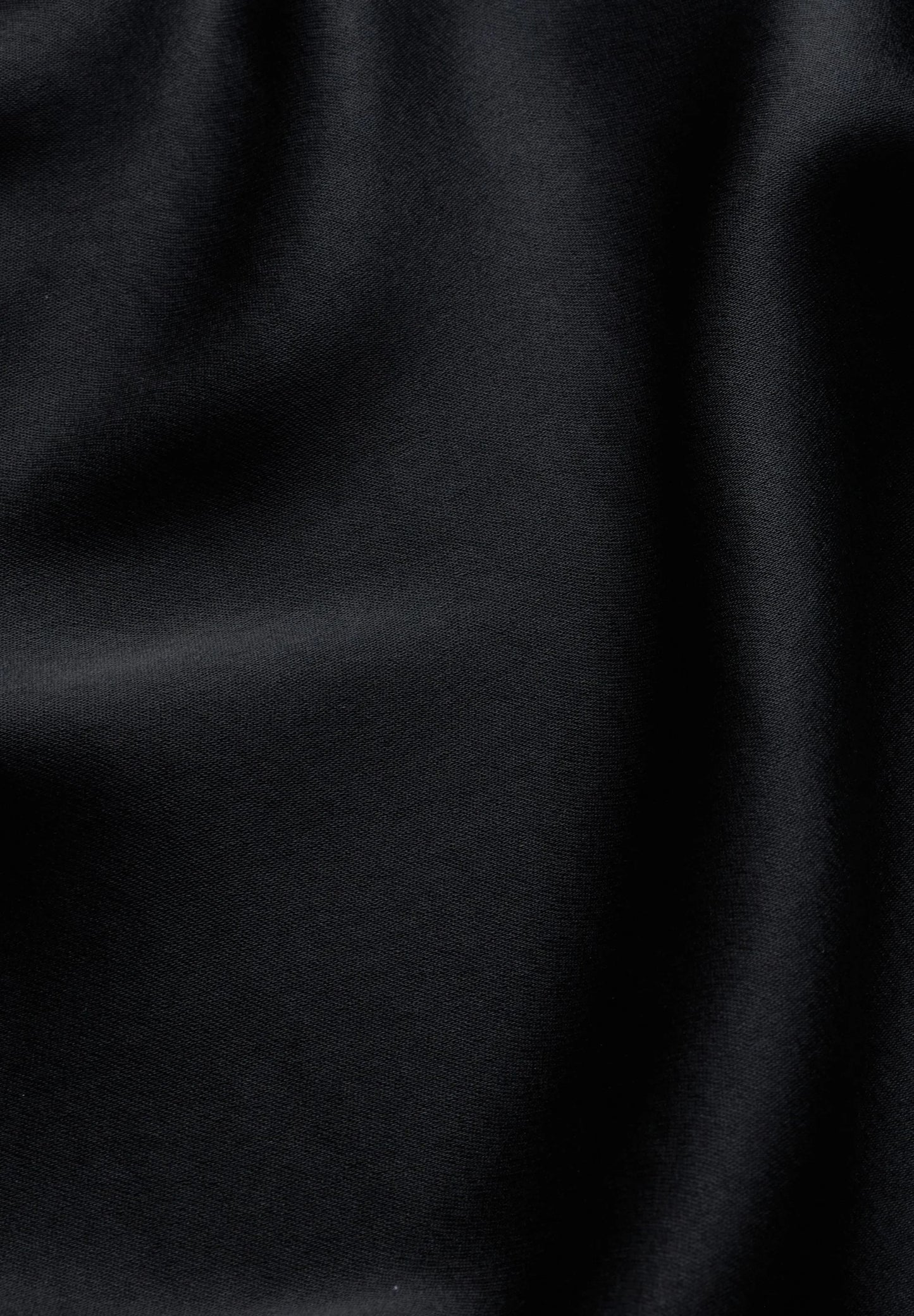 ARMEDANGELS Canada - LENOVAA Satin Slip-Skirt in Black - close-up of black satin fabric