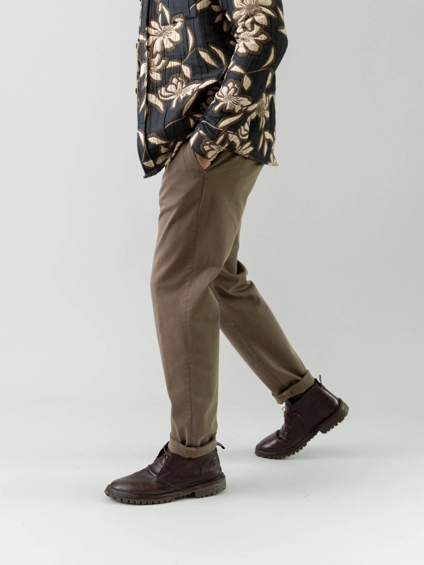 Men's MOS MOSH Gallery Canada pants in olive green with a relaxed fit, styled with a floral shirt and boots in Kelowna
