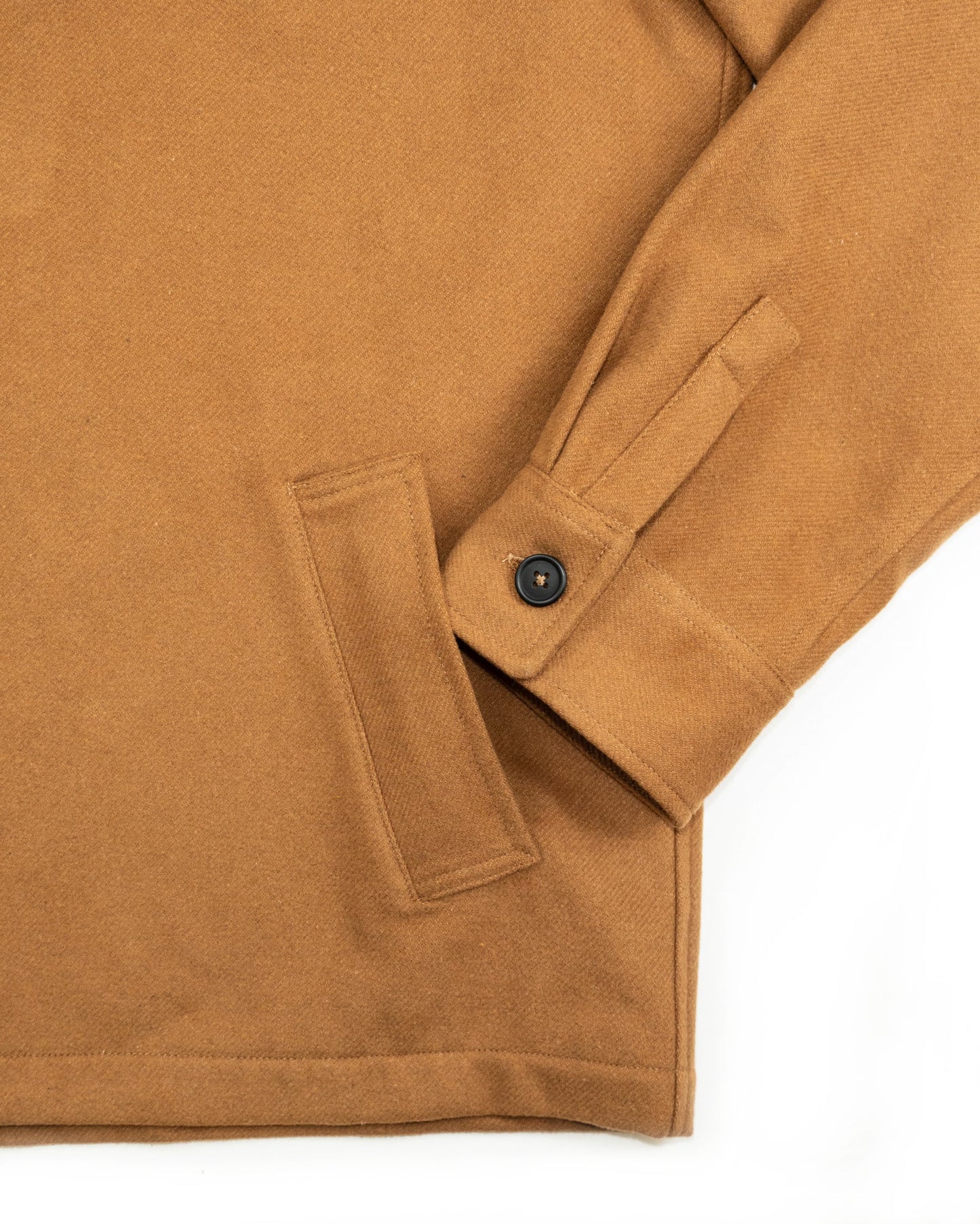 Anián - SS24 - The Eddie Coat in Timber - cuff and pocket close-up 8