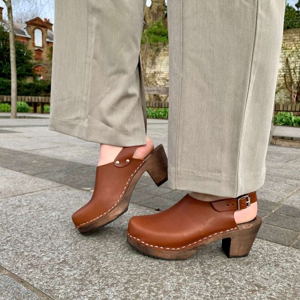 Brown clogs with clearance heel