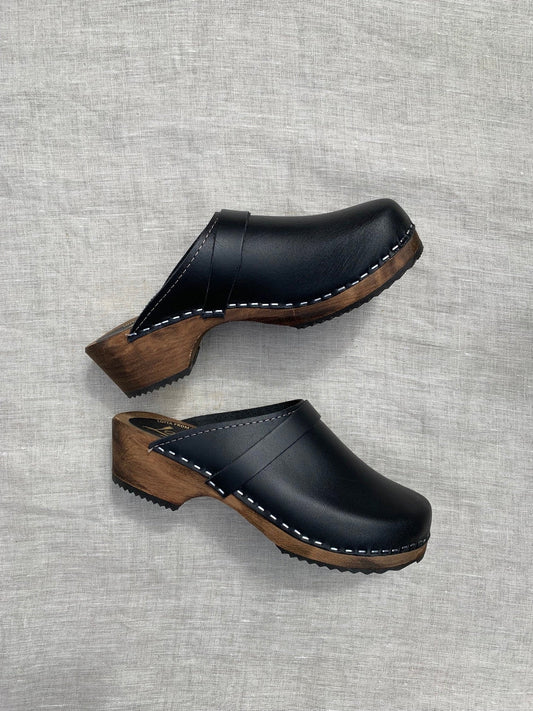 Classic Black Clogs on Brown Base